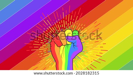 Rainbow fist over rainbow stripes background. lgbtq pride and equality celebration concept digitally generated .