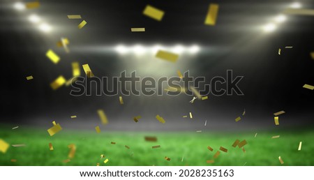 Image of golden confetti falling over empty sports stadium. competition victory celebration concept digitally generated image.