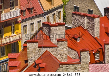QUEBEC CITY, QUEBEC, CANADA - MAY 31, 2004: Colorful rooftops and stonework of buildings near Place Royale in historic Old Quebec.