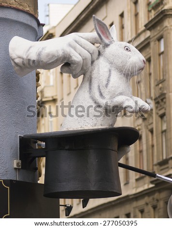 VIENNA, AUSTRIA - SEPTEMBER 14, 2003: magic shop sign, showing rabbit pulled from hat.