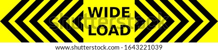Black and yellow vector graphic of outward pointing chevrons and text saying Wide Load. It would serve as a warning to drivers approaching lorries from he rear