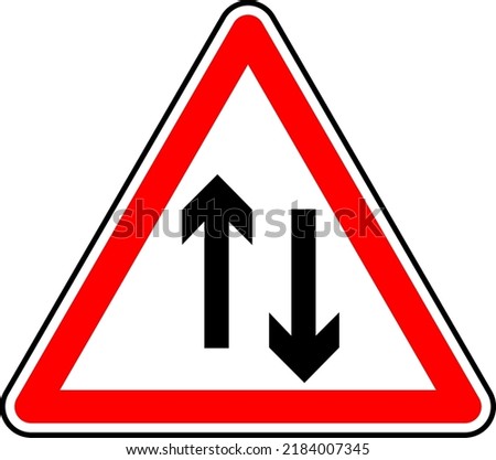 Vector graphic of a uk two way ahead road sign. It consists of two vertical arrows pointing in opposite directions contained within a red triangle