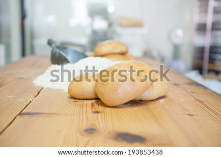 Italian bread on a wooden table.