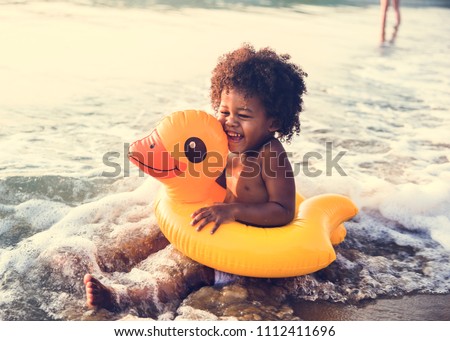 Similar – Foto Bild Kleine Kinder in Badebekleidung haben Spaß mit Spritzwasser