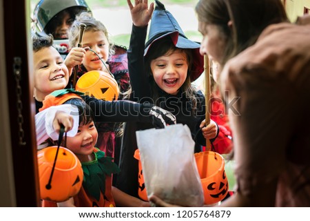 Little children trick or treating on Halloween Сток-фото © 