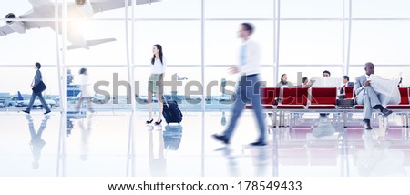 Group of People Walking in the Airport