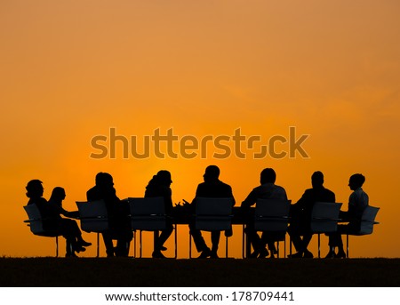 Silhouette of Business People Meeting at Sunset