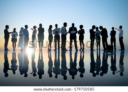 Group of Business People Meeting with Sunset