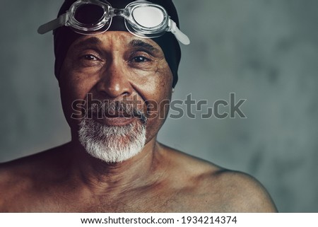 Similar – Image, Stock Photo Active senior man swimming and splashing in water