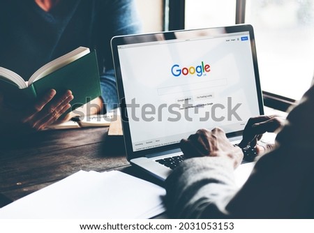 Bangkok, Thailand - October 14, 2015 Man Using Laptop Browsing Google Website