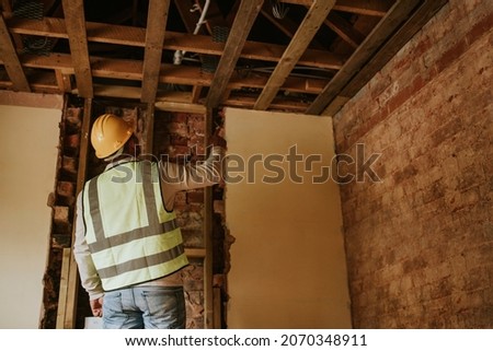 Contractor remodeling home for interior makeover Photo stock © 