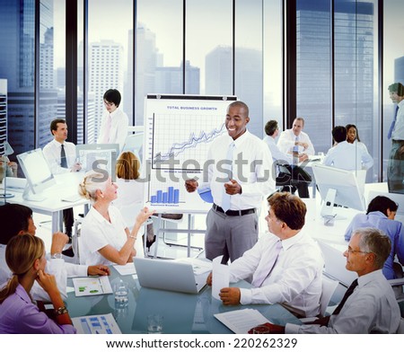 Diverse Business People Listening to a Business Presentation