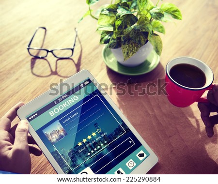 Man Booking Hotel Reservation on Digital Tablet