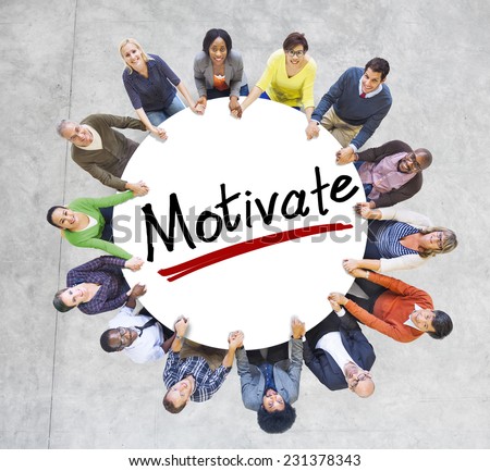 Group of People Holding Hands Around Letter Motivate