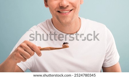 Similar – Image, Stock Photo Wooden toothbrushes with dental floss.