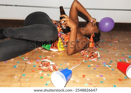 Similar – Image, Stock Photo Black woman scattering confetti on street