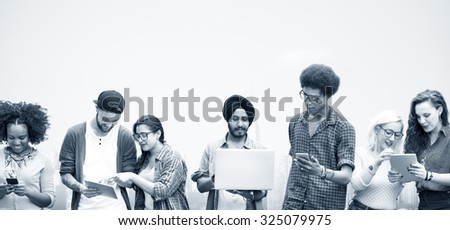 Diverse Students Studying Together Technology Concept