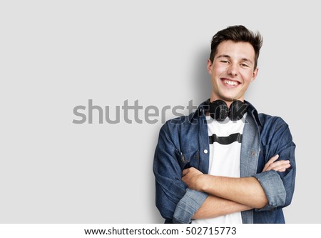 Similar – Image, Stock Photo Young Man with Earphones Posing in Autumn Park