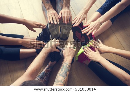 Similar – Image, Stock Photo Cheerful athletes practicing yoga together in mountain pose in contemporary workout room