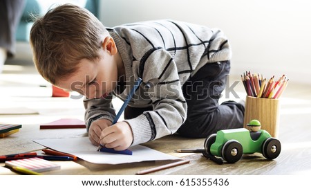 Similar – Image, Stock Photo Focused little kid drawing at table