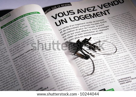 magazine in black and green color text with oldest small glasses