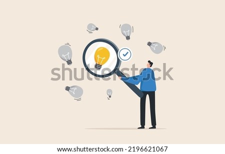 Validate Your Startup Idea. Find a problem enough to be worth solving.  Determine the validity of the idea from the idea. Businessman using a magnifying glass with a light bulb.