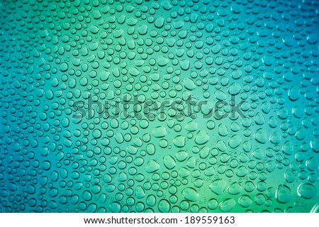 water drop on green  and blue background