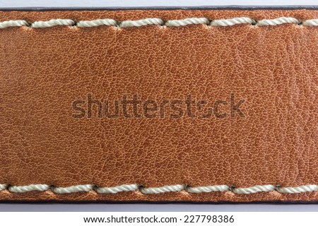 Brown Leather with thread sewed texture background