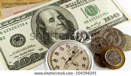 time is money - timer with money on background