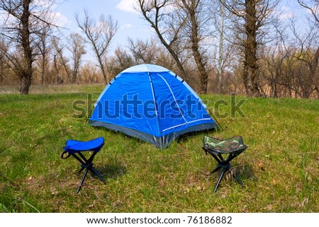 Tourist camp in spring forest