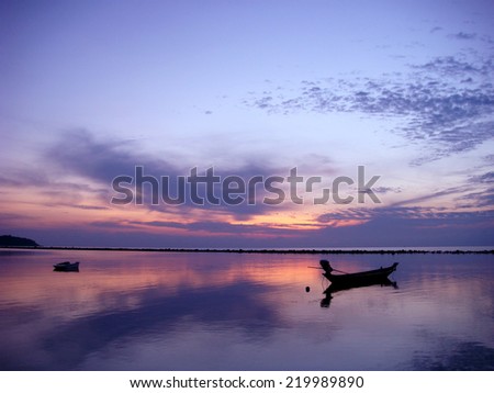 Thai Fishing Boats on Still Water at Sunrise