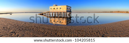 Panoramic of  historic life-guard building in Fuseta, at Ria Formosa conservation park, Algarve. Portugal