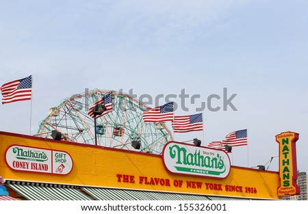 NEW YORK - SEPTEMBER 01: Nathan\'s sign on September 01, 2013 in Coney Island, NY. Nathan\'s Famous, Inc. (NASDAQ: NATH) operates a chain of U.S.-based restaurants specializing in hot dogs.