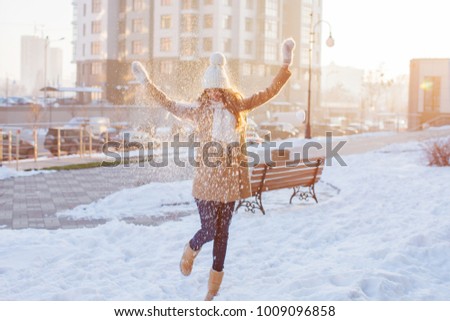 Similar – Image, Stock Photo Woman playing with snow on winter field