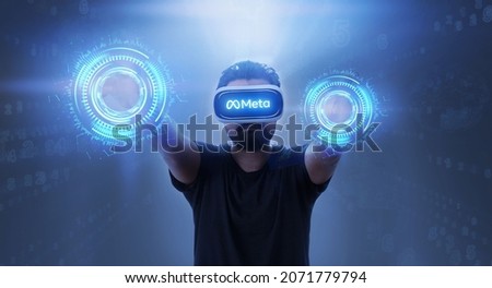 Meta Written On The Googles - Man Wearing Virtual Reality Goggles Inside A Metaverse Photo stock © 