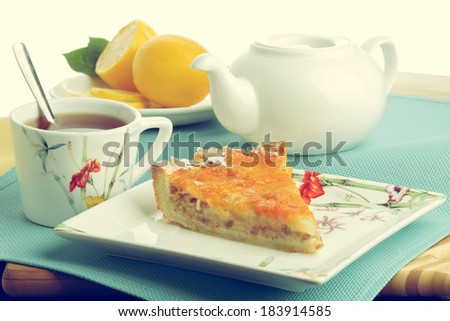 Cake slice with tea. Healthy breakfast. Vintage look.