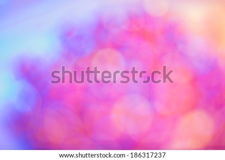 Artificial background bokeh.  Abstract blurred background. Orange and green defocused background.