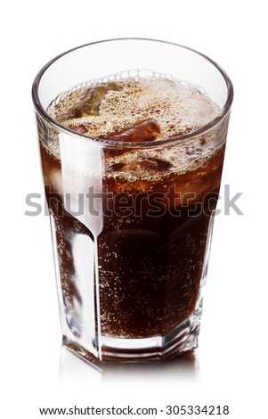 Malta soda (soft drink) in a glass with ice. Lightly carbonated malt beverage, brewed from barley and hops. Also known as Malzbier, malztrunk,kinderbier.