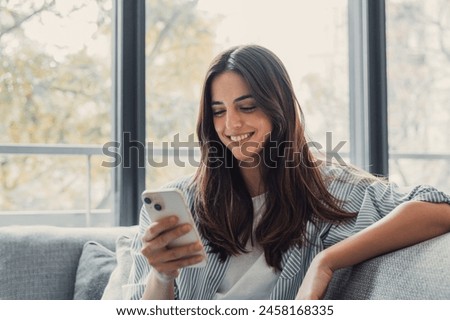 Image, Stock Photo Young woman with medium length waving her hands raised up in front of colorful flower bush. Glitch effect.