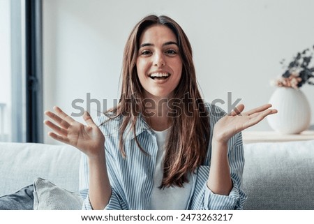 Image, Stock Photo Smiling woman speaking on smartphone near building