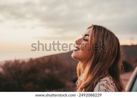 Similar – Image, Stock Photo woman with a face mask leaning against the wall using her smartphone