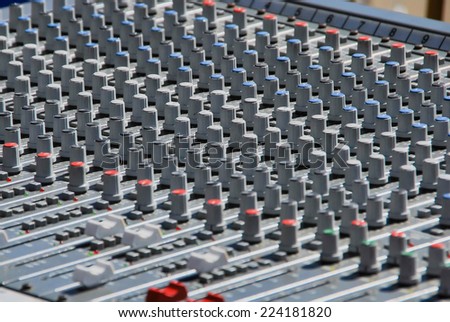 Sound mixer console plenty of buttons. Electronic technology for sound and music
