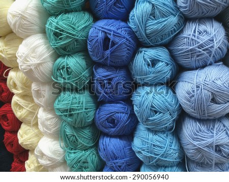 Many balls of wool in diverse colors