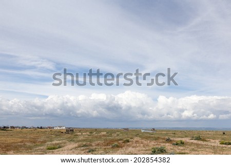 Panoramic seaside scenery with storm clouds in the horizon