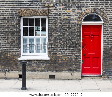 Red house door on a London street