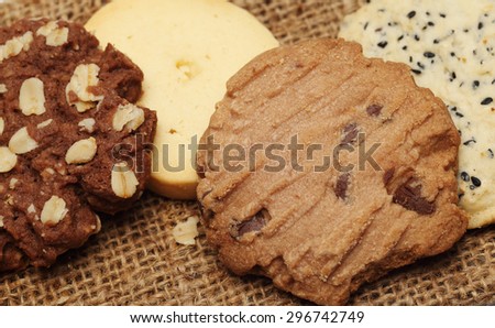 The chocolate cookies on sack set for relax and break from meeting. Close up Concept