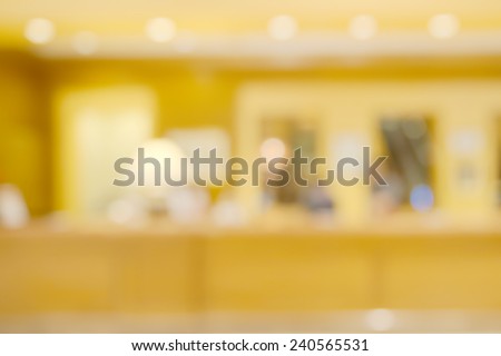 Abstract blurry empty reception area in warm light ambient