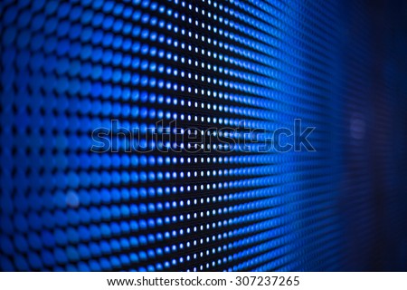 Blue led screen mesh close up radial blur