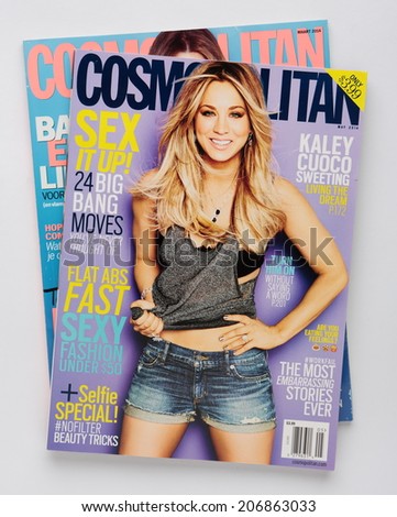 MALESICE, CZECH REPUBLIC - MAY 02, 2014: stack of US edition of magazine Cosmopolitan, on top issue May 2014 with Kaley Cuoco Sweeting on cover, on display in Malesice, Czech republic in May 2014