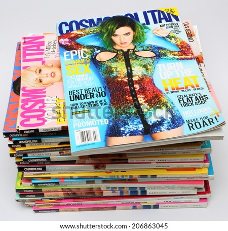 MALESICE, CZECH REPUBLIC - MAY 02, 2014: stack of US edition of magazine Cosmopolitan, on top issue July 2014 with Katy Perry on cover, on display in Malesice, Czech republic in May 2014